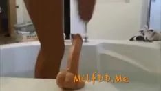 Play Big titted milf toys in the shower down with a dildo - milfddme